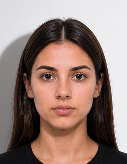 Passport photo rejected due to strong shadow behind subject on plain background