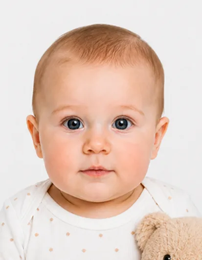 Rejected UK baby passport photo example showing toy visible in frame against white background during passport application.